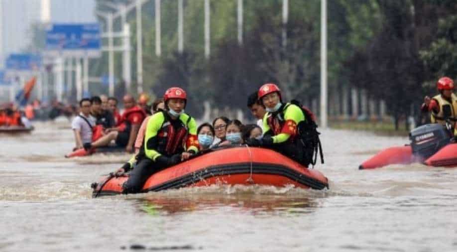Corpses float in parking lots, tunnels: China floods, the death toll rises to 302
